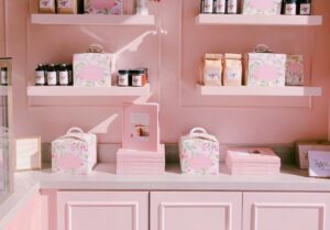 products on a pink shelf